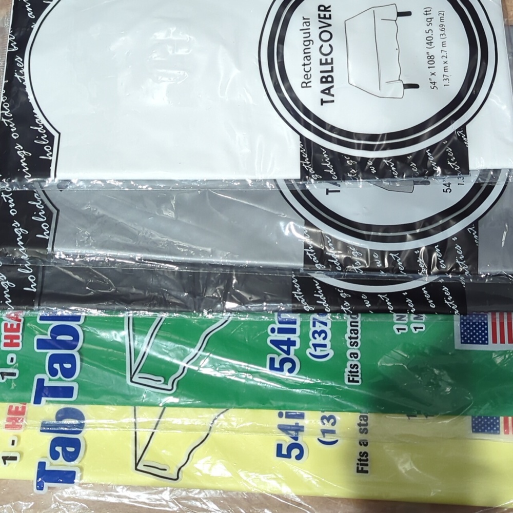 Assorted rectangular plastic disposable table cloths  54"x 108"   5 colors